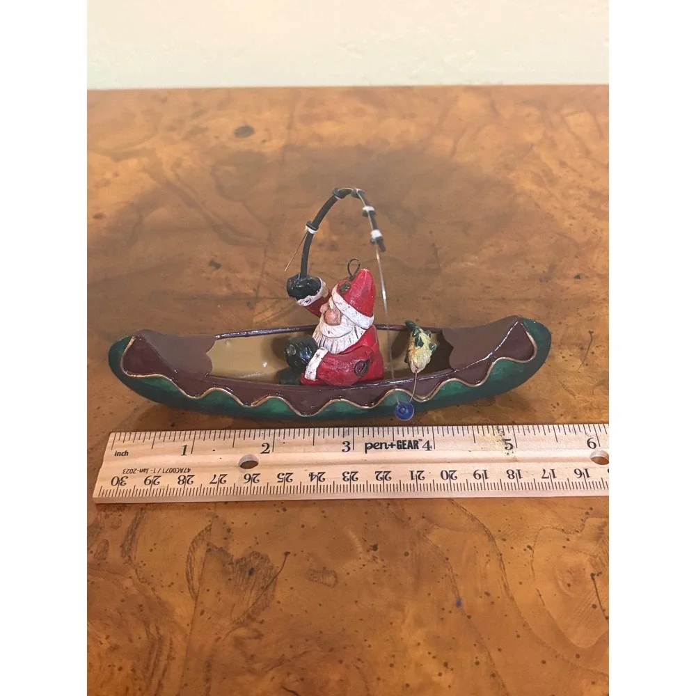 Vintage Santa in Canoe Fishing Figurine Christmas Holiday Decor Rustic Cabin
